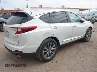 2021 Acura RDX w/Technology Package with VIN 5J8TC1H51ML022573, listed as a IAAI auction lot 41893265 with 56,516 mi miles. Bid and sale history available at carsss.com. Image 4.