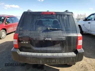 2010 Jeep Patriot Sport with VIN 1J4NF2GB8AD519311, listed as a Copart auction lot 53799085 with 203,762 mi miles and Salvage Title. Bid and sale history available at carsss.com. Image 6.