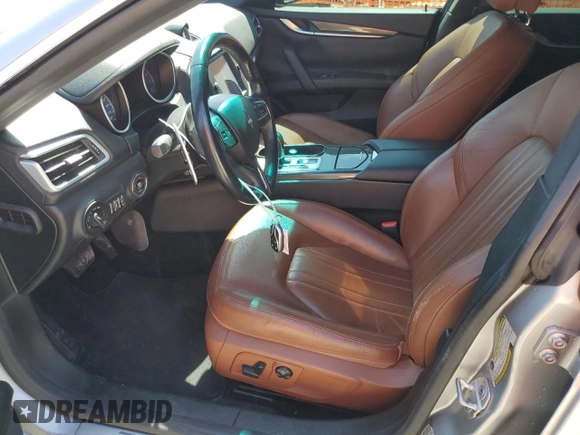 2015 Maserati Ghibli с VIN ZAM57XSA9F1154155, выставлен на аукционе Copart как лот 57093695 с пробегом 63 190 миль миль и Списание • Salvage title. История ставок и продаж доступна на DreamBid. Изображение 7.