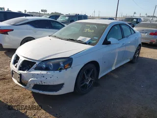 2010 Pontiac G6 w/1SB with VIN 1G2ZA5EB2A4103396, listed as a IAAI auction lot 42014797 with 1 mi miles. Bid and sale history available at carsss.com. Image 2.