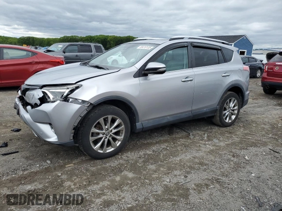 2016 Toyota RAV4 Limited with VIN 2T3DFREVXGW524075, listed as a Copart auction lot 58410135 with 84,042 mi miles and Salvage title. Bid and sale history available at DreamBid. Image 1.