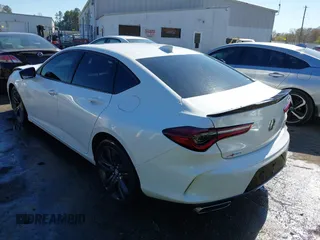 2022 Acura TLX w/A-Spec Package with VIN 19UUB6F52NA002062, listed as a IAAI auction lot 41853469 with 77,301 mi miles and . Bid and sale history available at DreamBid. Image 3.