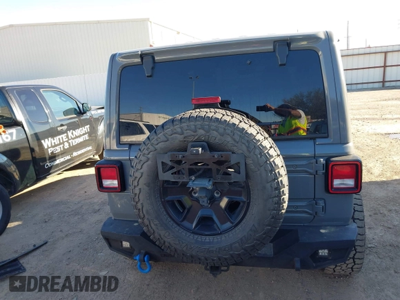 2018 Jeep Wrangler Unlimited Sahara with VIN 1C4HJXEG8JW239535, listed as a IAAI auction lot 41711596 with 85,675 mi miles. Bid and sale history available at carsss.com. Image 17.