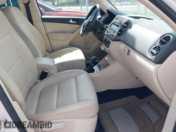 2012 Volkswagen Tiguan SE with VIN WVGAV7AX4CW579341, listed as a IAAI auction lot 42618922 with 118,855 mi miles and . Bid and sale history available at DreamBid. Image 5.