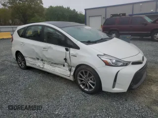 2016 Toyota Prius v Two with VIN JTDZN3EU9GJ048493, listed as a Copart auction lot 50825405 with 56,998 mi miles and Salvage Title. Bid and sale history available at carsss.com. Image 4.