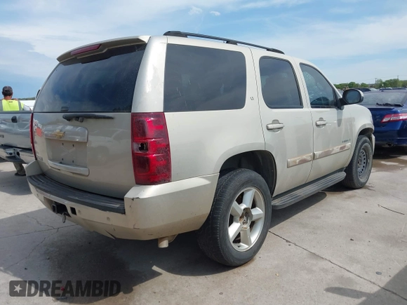 2007 Chevrolet Tahoe LS z VIN 1GNFC13J97R308812, wystawiony jako IAAI lot #41898016 z przebiegiem 178 559 mil mil oraz . Historia ofert i sprzedaży dostępna na DreamBid. Obrazek 4.