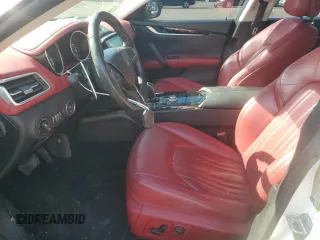 2017 Maserati Ghibli z VIN ZAM57XSA5H1216203, wystawiony jako Copart lot #51991055 z przebiegiem 70 203 mil mil oraz Szkody całkowita. Historia ofert i sprzedaży dostępna na DreamBid. Obrazek 7.