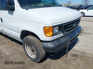 2004 Ford Econoline Cargo Commercial with VIN 1FTSE34P54HB35498, listed as a IAAI auction lot 41970490 with 155,186 mi miles. Bid and sale history available at carsss.com. Image 6.