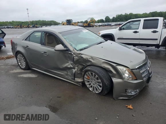 2010 Cadillac CTS Premium with VIN 1G6DS5EV3A0116911, listed as a Copart auction lot 57394905 with 126,084 mi miles and Salvage title. Bid and sale history available at DreamBid. Image 4.