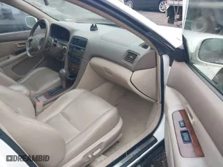 2000 Lexus ES 300 with VIN JT8BF28G3Y0246877, listed as a IAAI auction lot 40365916 with 153,569 mi miles. Bid and sale history available at carsss.com. Image 5.