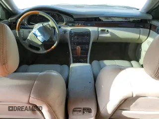 2003 Cadillac Seville Touring STS z VIN 1G6KY54923U101998, wystawiony jako Copart lot #74029304 z przebiegiem 134 157 mil mil oraz Szkoda całkowita • Salvage title. Historia ofert i sprzedaży dostępna na DreamBid. Obrazek 8.