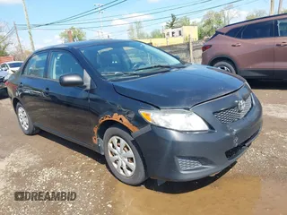 2009 Toyota Corolla with VIN 2T1BU40E39C147688, listed as a IAAI auction lot 42200563 with 304,902 mi miles and . Bid and sale history available at DreamBid. Image 1.
