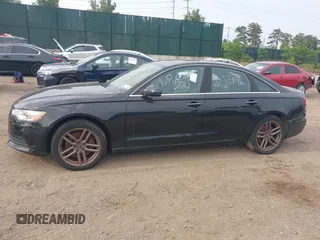 2015 Audi A6 Premium Plus z VIN WAUGFAFCXFN010306, wystawiony jako IAAI lot #42505993 z przebiegiem Nie podano mil oraz . Historia ofert i sprzedaży dostępna na DreamBid. Obrazek 13.