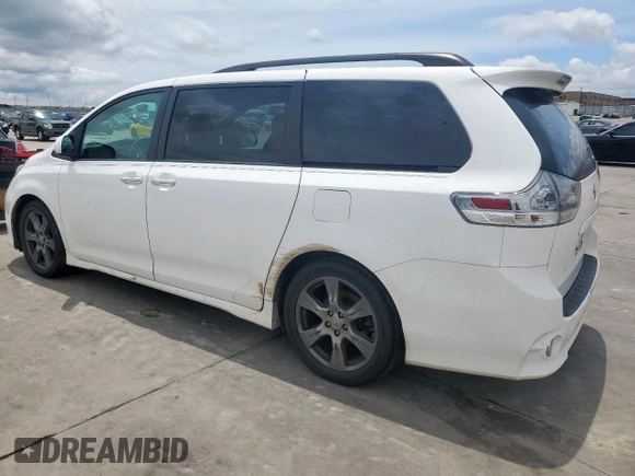 2017 Toyota Sienna SE with VIN 5TDXZ3DC9HS821990, listed as a Copart auction lot 60912365 with 182,672 mi miles and Salvage title. Bid and sale history available at DreamBid. Image 2.