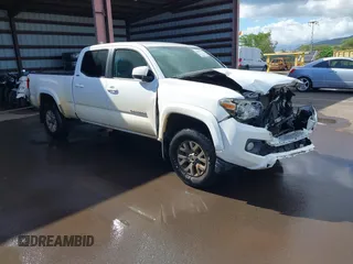 2016 Toyota Tacoma SR5 z VIN 3TMBZ5DN6GM003977, wystawiony jako IAAI lot #41859709 z przebiegiem 156 968 mil mil oraz . Historia ofert i sprzedaży dostępna na DreamBid. Obrazek 1.