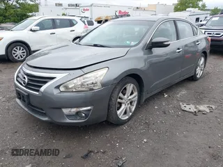 2015 Nissan Altima SL z VIN 1N4BL3AP8FC581581, wystawiony jako IAAI lot #42331651 z przebiegiem 65 846 mil mil oraz . Historia ofert i sprzedaży dostępna na DreamBid. Obrazek 16.