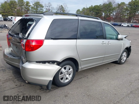 2008 Toyota Sienna XLE with VIN 5TDZK22C38S151671, listed as a IAAI auction lot 41046569 with 119,239 mi miles. Bid and sale history available at carsss.com. Image 4.