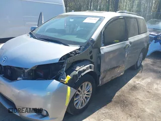 2015 Toyota Sienna XLE with VIN 5TDYK3DC0FS558486, listed as a IAAI auction lot 42064281 with 211,119 mi miles and . Bid and sale history available at DreamBid. Image 6.