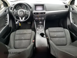 2016 Mazda CX-5 Touring with VIN JM3KE4CY6G0655381, listed as a Copart auction lot 53311445 with 145,513 mi miles and Salvage Title. Bid and sale history available at carsss.com. Image 8.