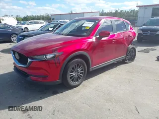 2020 Mazda CX-5 Sport with VIN JM3KFABM7L1819493, listed as a IAAI auction lot 41304240 with 52,940 mi miles. Bid and sale history available at carsss.com. Image 17.