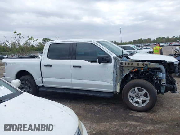 2024 Ford F-150 Lightning XLT with VIN 1FTVW3LKXRWG01185, listed as a IAAI auction lot 41679606 with 4,961 mi miles and . Bid and sale history available at DreamBid. Image 14.
