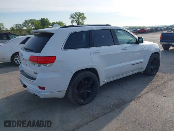 2018 Jeep Grand Cherokee Summit with VIN 1C4RJFJG0JC107732, listed as a IAAI auction lot 42328645 with 109,601 mi miles and . Bid and sale history available at DreamBid. Image 4.