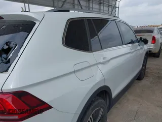 2018 Volkswagen Tiguan SEL with VIN 3VV2B7AX8JM120443, listed as a IAAI auction lot 42154773 with 70,256 mi miles and . Bid and sale history available at DreamBid. Image 20.