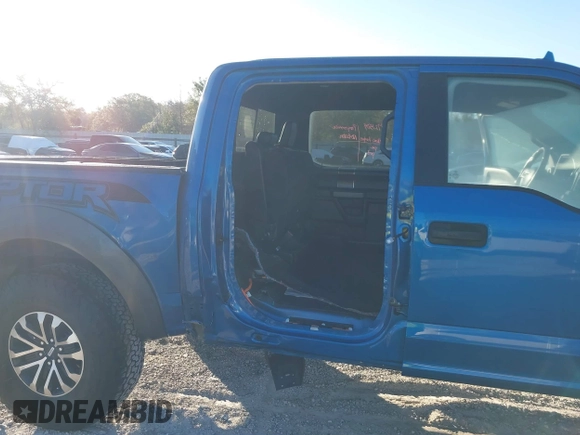 2020 Ford F-150 Raptor with VIN 1FTFW1RG6LFA91517, listed as a IAAI auction lot 41800990 with 112,535 mi miles and . Bid and sale history available at carsss.com. Image 6.