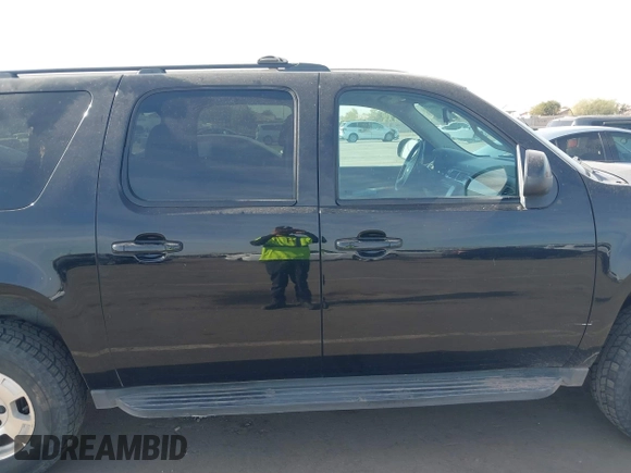 2013 Chevrolet Suburban LS with VIN 1GNSKHE71DR332335, listed as a IAAI auction lot 41408949 with 167,860 mi miles. Bid and sale history available at carsss.com. Image 13.