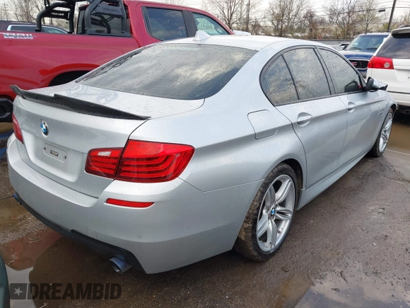 2015 BMW 5 Series 535i xDrive with VIN WBA5B3C50FD544036, listed as a IAAI auction lot 41902652 with 184,735 mi miles. Bid and sale history available at carsss.com. Image 4.