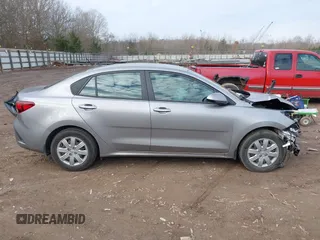 2023 Kia Rio LX z VIN 3KPA24AD7PE520723, wystawiony jako IAAI lot #41184281 z przebiegiem 11 971 mil mil oraz . Historia ofert i sprzedaży dostępna na DreamBid. Obrazek 13.