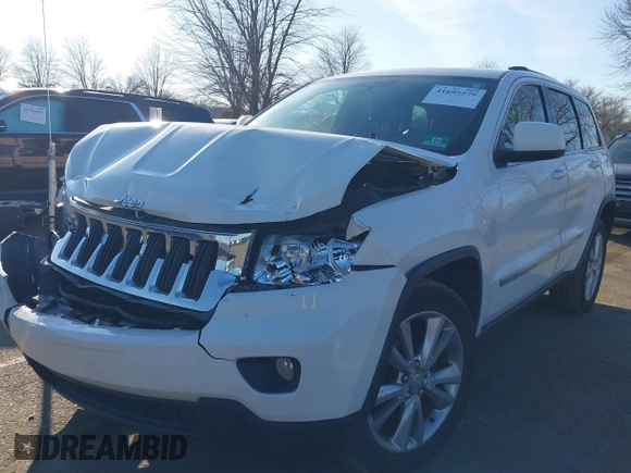2012 Jeep Grand Cherokee Laredo with VIN 1C4RJFAG5CC310893, listed as a IAAI auction lot 41695279 with 136,821 mi miles. Bid and sale history available at carsss.com. Image 17.