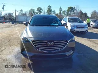 2022 Mazda CX-9 Sport with VIN JM3TCBBY5N0614589, listed as a IAAI auction lot 41295944 with 49,193 mi miles and . Bid and sale history available at DreamBid. Image 12.