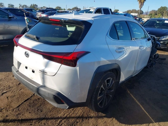 2022 Lexus UX with VIN JTHX3JBH7N2050208, listed as a IAAI auction lot 41313579 with 65,421 mi miles. Bid and sale history available at carsss.com. Image 4.