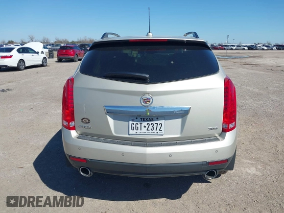 2015 Cadillac SRX Luxury Collection z VIN 3GYFNBE38FS641807, wystawiony jako IAAI lot #41669512 z przebiegiem 147 889 mil mil oraz . Historia ofert i sprzedaży dostępna na DreamBid. Obrazek 16.