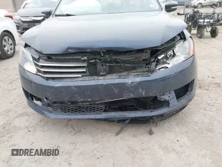 2013 Volkswagen Passat SE z VIN 1VWBP7A37DC145575, wystawiony jako IAAI lot #41253095 z przebiegiem 93 702 mil mil oraz . Historia ofert i sprzedaży dostępna na DreamBid. Obrazek 6.