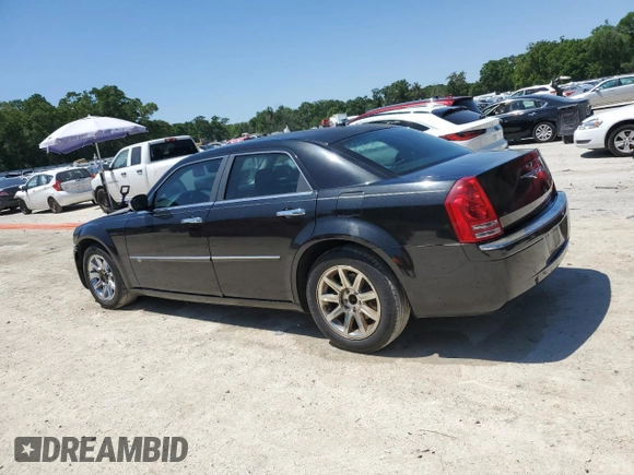2008 Chrysler 300 C Hemi with VIN 2C3KA63H08H156142, listed as a Copart auction lot 53741595 with 216,677 mi miles and Salvage Title. Bid and sale history available at carsss.com. Image 2.