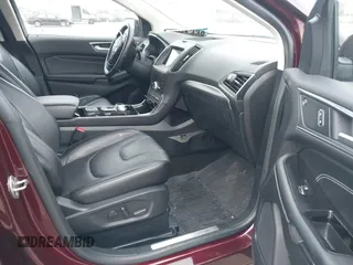 2020 Ford Edge Titanium z VIN 2FMPK4K91LBB56297, wystawiony jako IAAI lot #41938896 z przebiegiem 79 875 mil mil oraz . Historia ofert i sprzedaży dostępna na DreamBid. Obrazek 5.