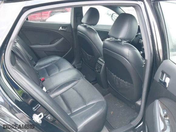 2013 Kia Optima SX w/Limited Pkg with VIN 5XXGR4A6XDG121265, listed as a IAAI auction lot 40771144 with 129,247 mi miles. Bid and sale history available at carsss.com. Image 8.