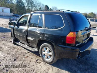 2005 GMC Envoy SLE with VIN 1GKDS13S152246568, listed as a IAAI auction lot 41293887 with 315,882 mi miles and . Bid and sale history available at DreamBid. Image 3.