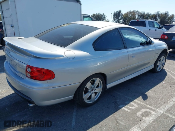 2005 Pontiac GTO with VIN 6G2VX12U05L369686, listed as a IAAI auction lot 41975716 with 64,893 mi miles. Bid and sale history available at carsss.com. Image 4.