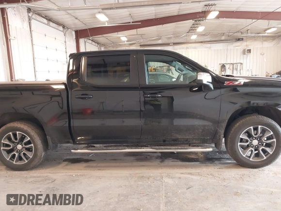 2022 Chevrolet Silverado 1500 LT with VIN 3GCUYDED2NG129499, listed as a IAAI auction lot 41965154 with 32,659 mi miles and . Bid and sale history available at DreamBid. Image 14.