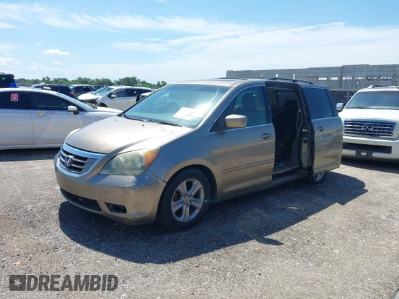 2010 Honda Odyssey Touring с VIN 5FNRL3H93AB069531, выставлен на аукционе IAAI как лот 42462835 с пробегом 241 297 миль миль и . История ставок и продаж доступна на DreamBid. Изображение 2.