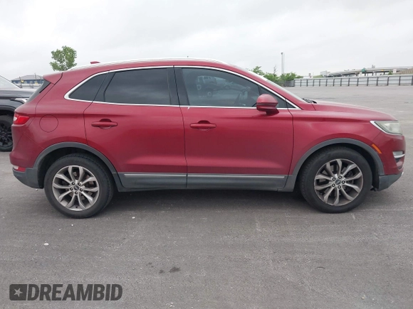 2015 Lincoln MKC with VIN 5LMCJ1A97FUJ30994, listed as a IAAI auction lot 42159219 with 180,802 mi miles. Bid and sale history available at carsss.com. Image 13.