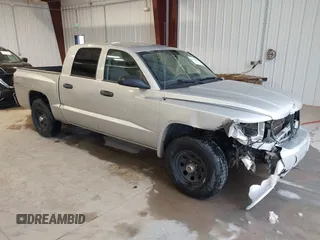 2008 Dodge Dakota SLT with VIN 1D7HW48N18S562245, listed as a IAAI auction lot 40939208 with 230,571 mi miles and . Bid and sale history available at DreamBid. Image 1.