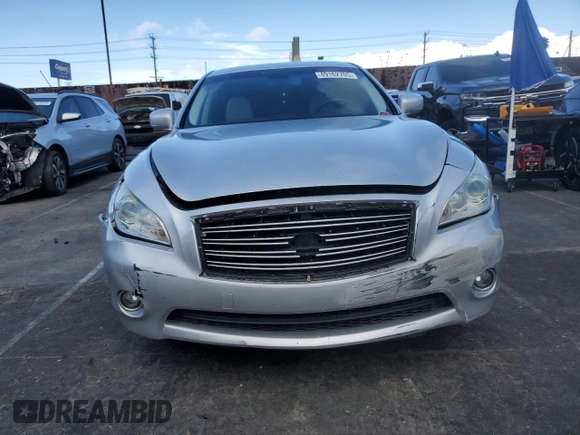 2012 Infiniti M Hybrid with VIN JN1EY1AP3CM910631, listed as a Copart auction lot 49162705 with 128,771 mi miles and Salvage title. Bid and sale history available at DreamBid. Image 5.