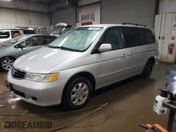 2004 Honda Odyssey EX-L with VIN 5FNRL189X4B098131, listed as a Copart auction lot 47294865 with 196,581 mi miles and Salvage Title. Bid and sale history available at DreamBid. Image 1.