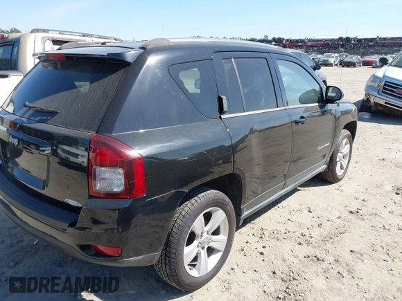 2014 Jeep Compass Latitude with VIN 1C4NJDEBXED551427, listed as a IAAI auction lot 41863047 with 75,913 mi miles. Bid and sale history available at carsss.com. Image 4.
