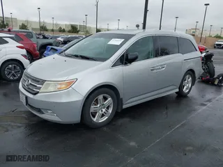 2012 Honda Odyssey Touring with VIN 5FNRL5H99CB055499, listed as a IAAI auction lot 41916534 with 278,435 mi miles. Bid and sale history available at carsss.com. Image 2.
