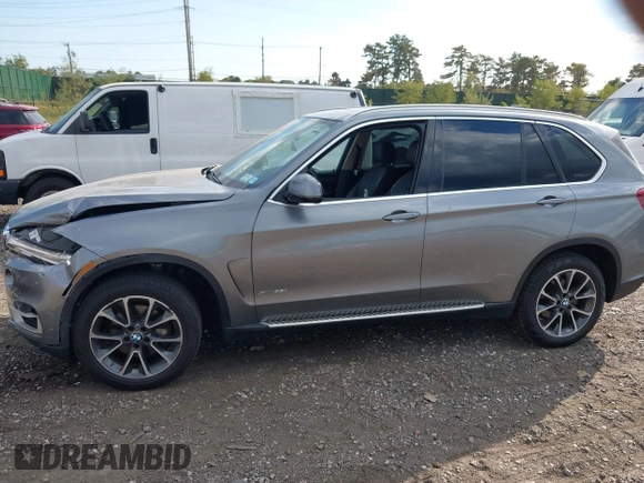 2014 BMW X5 xDrive35i with VIN 5UXKR0C52E0K50710, listed as a IAAI auction lot 40529606 with 114,307 mi miles. Bid and sale history available at carsss.com. Image 14.